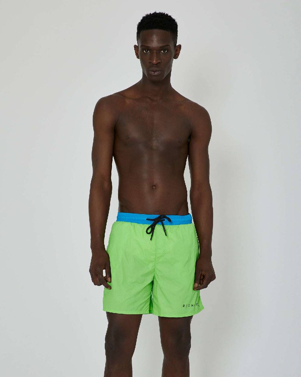 John Richmond Costume bicolor con logo sul davanti