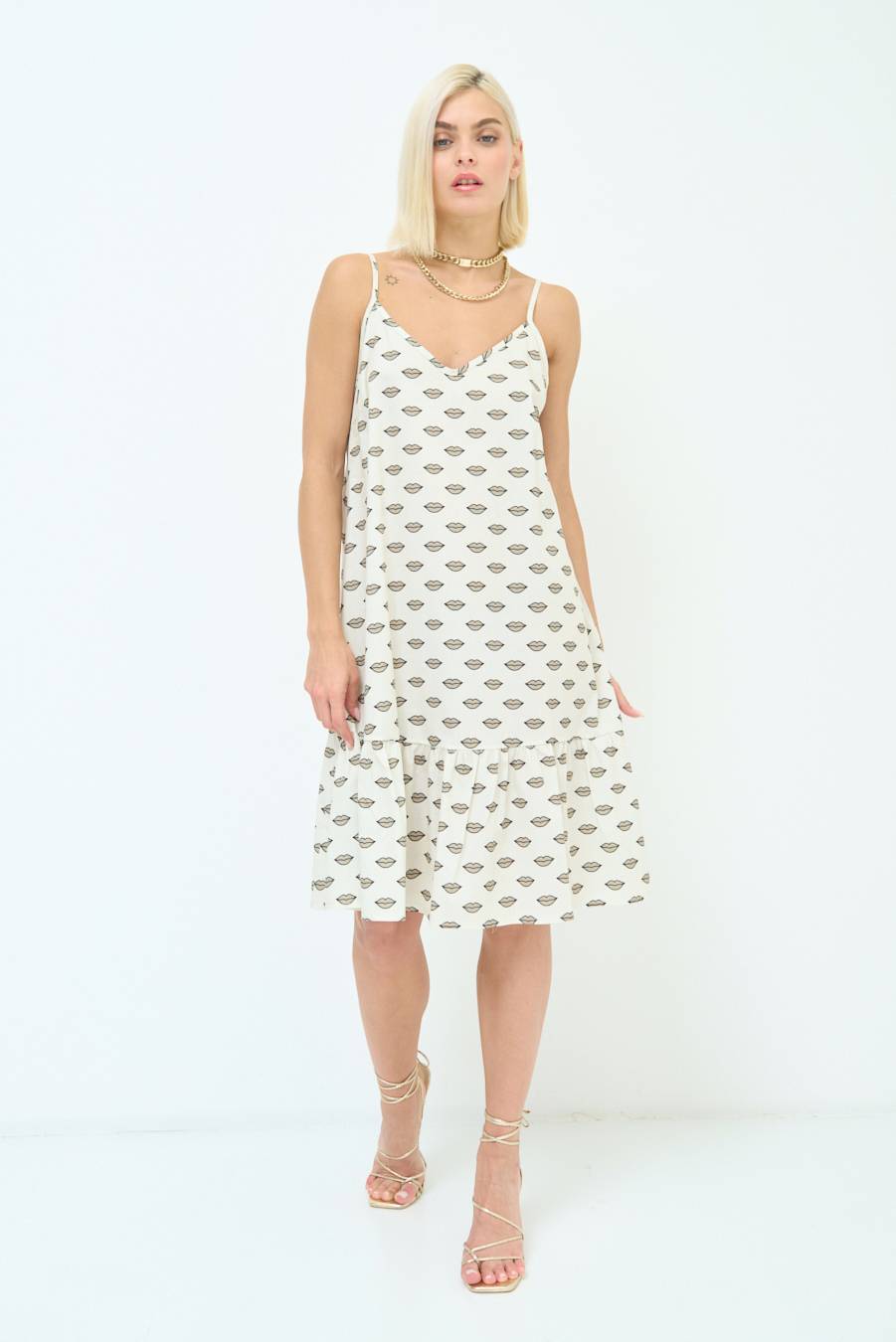 Kikisix ABITINO BALZA FONDO BIANCO