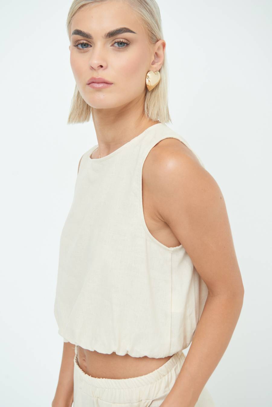 Kikisix TOP CORTO CON ELASTICO NATURALE