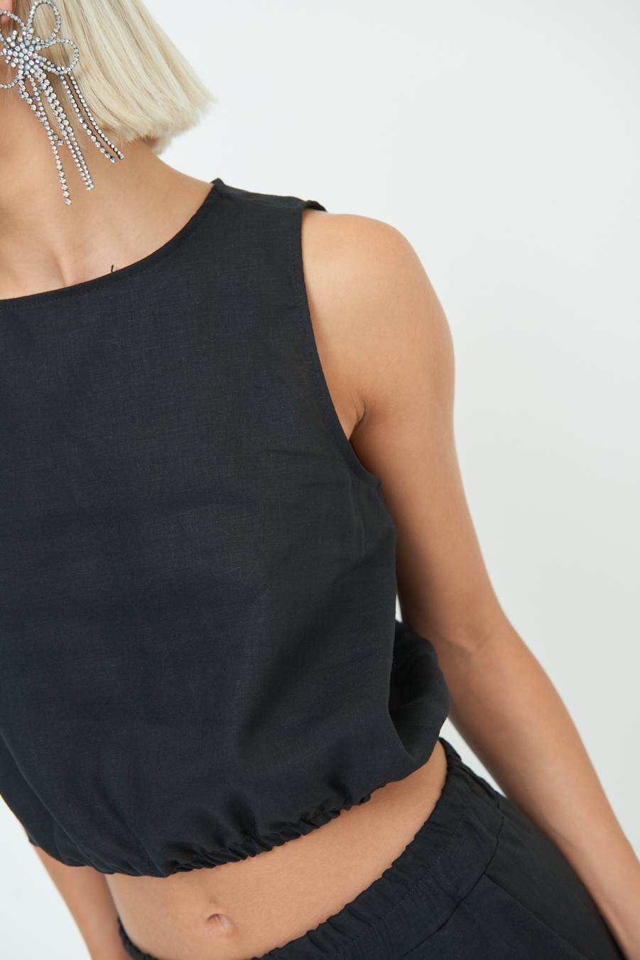 Kikisix TOP CORTO CON ELASTICO NERO