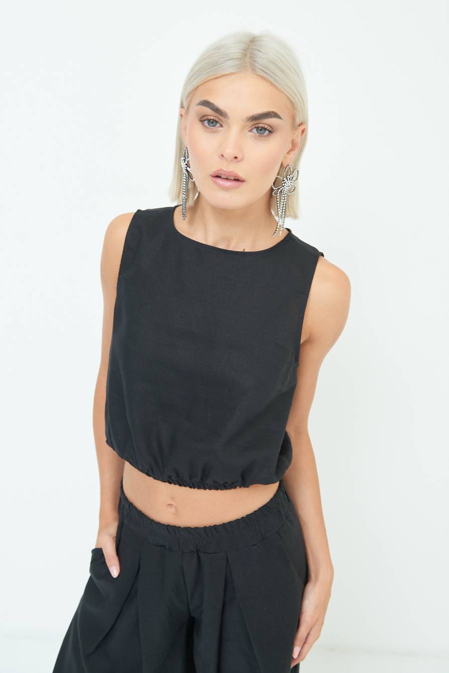Kikisix TOP CORTO CON ELASTICO NERO