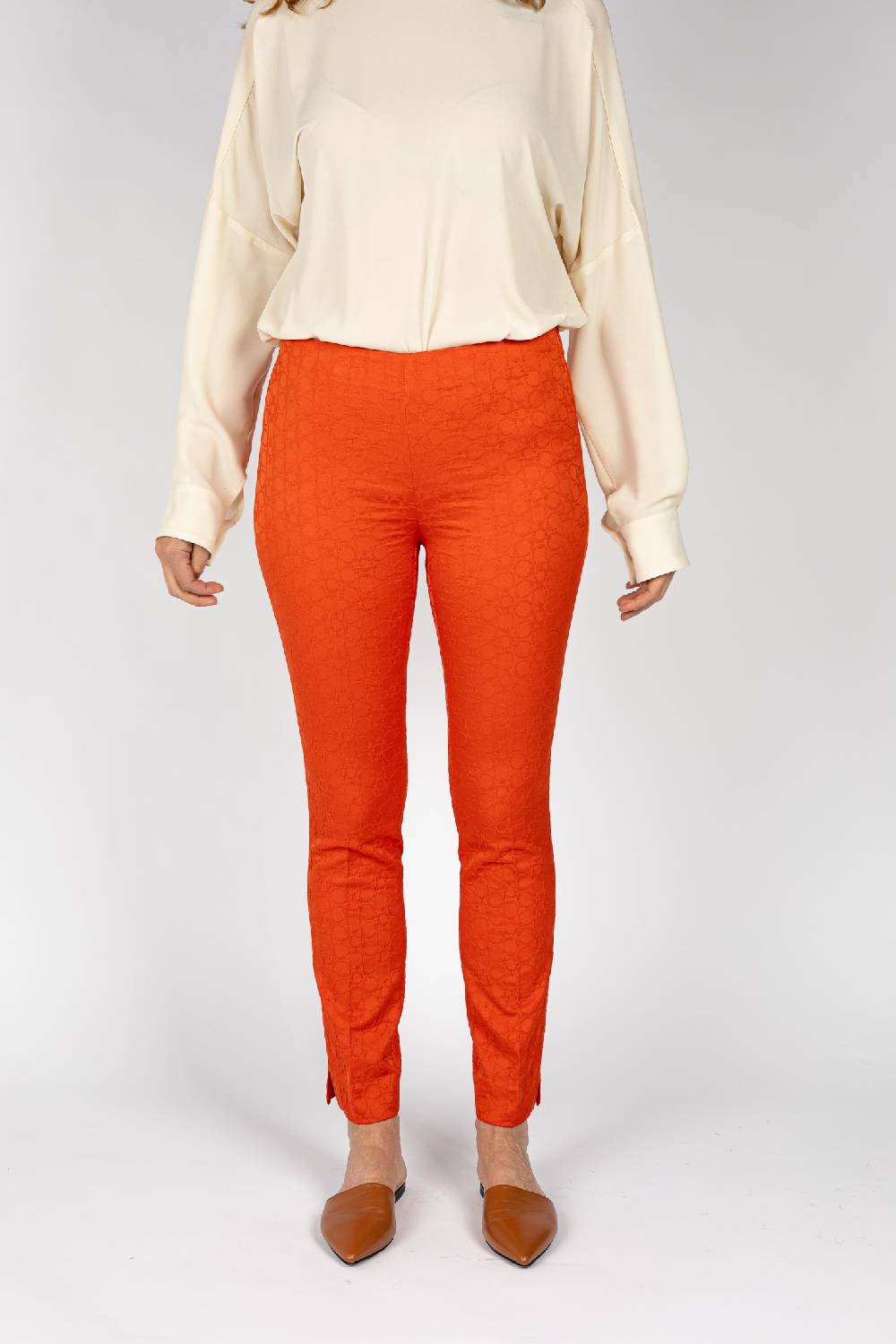 L.Pucci Pantaloni jacquard a fiore colore arancio, linea stretta