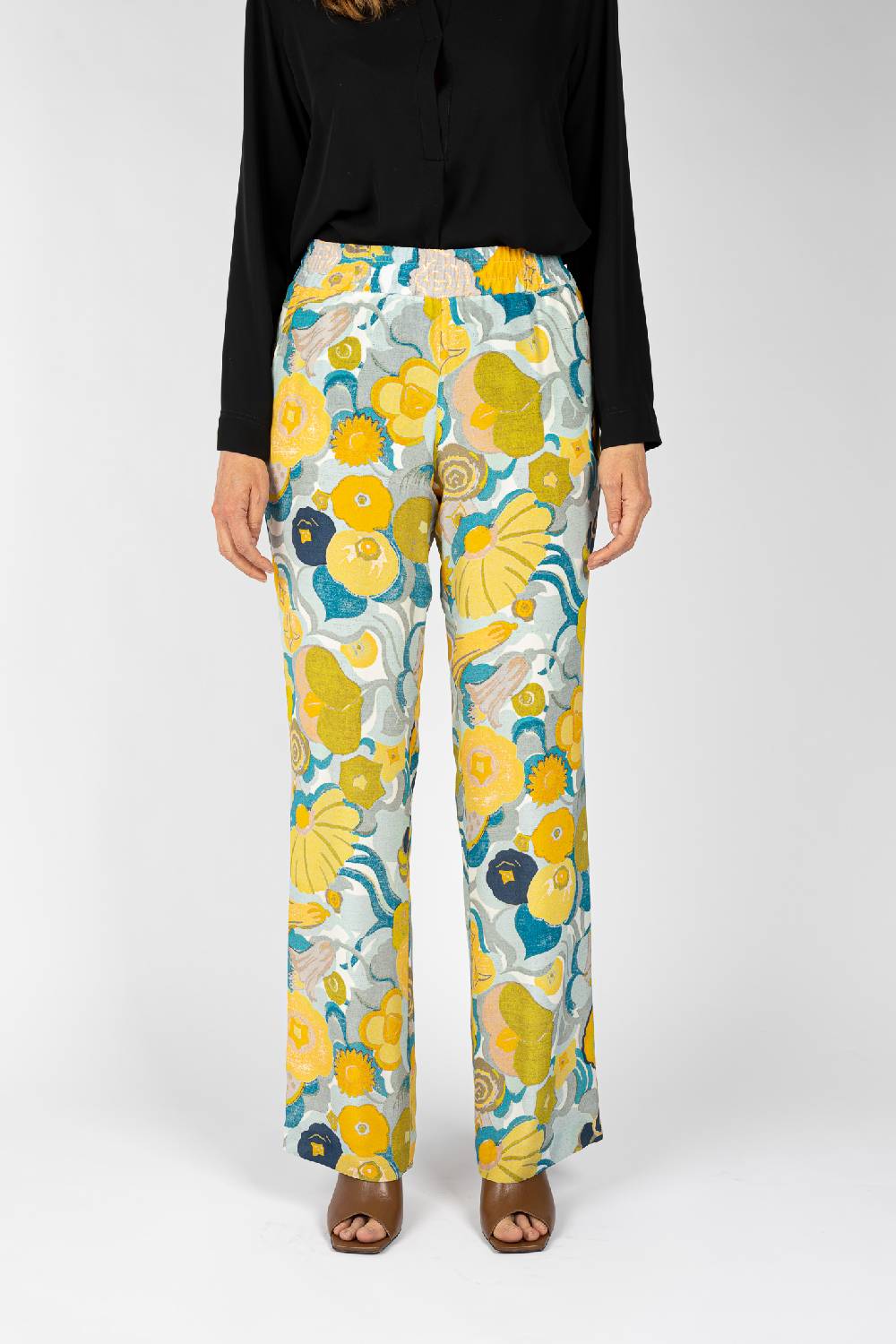 L.Pucci Pantaloni stampati disegno fiori sul giallo linea morbida da donna