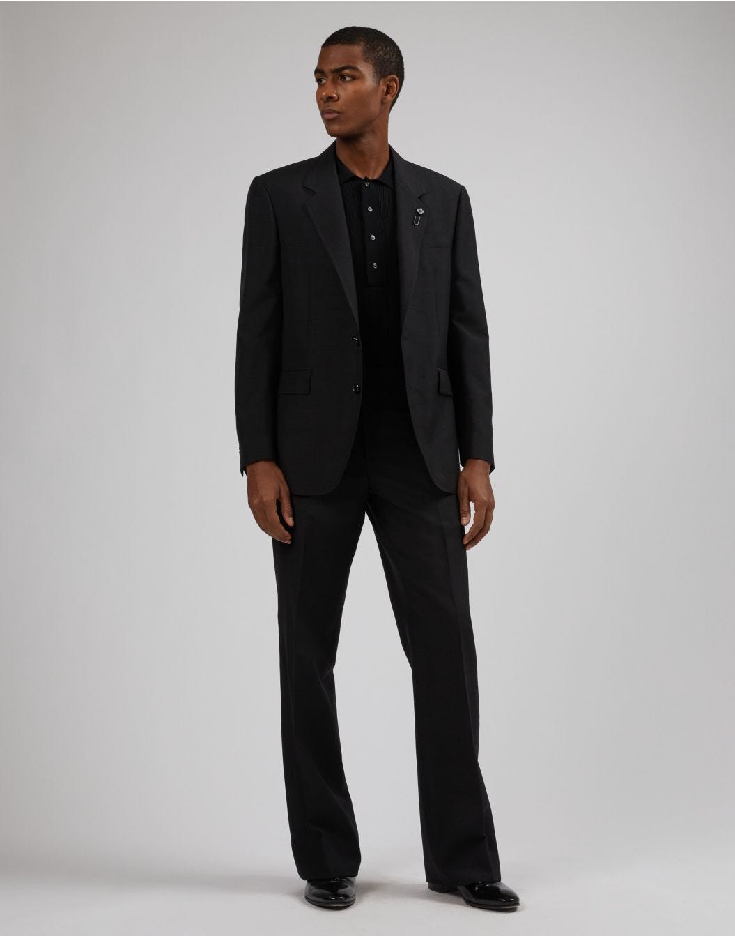 Lardini Polo Nera Con Bottoni E Lavorazione A Costina