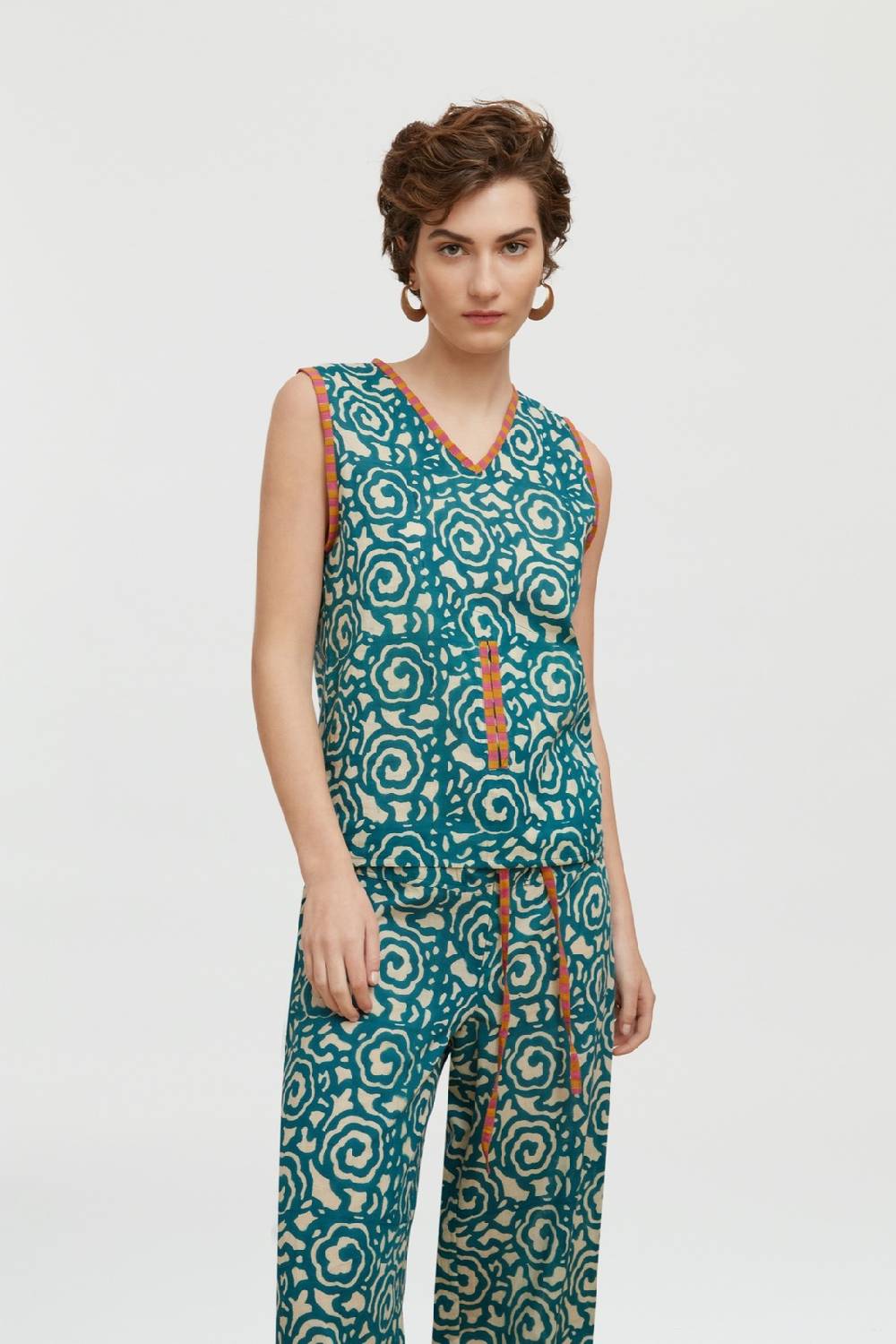 Lisa Corti top banyan spiral peacock natural