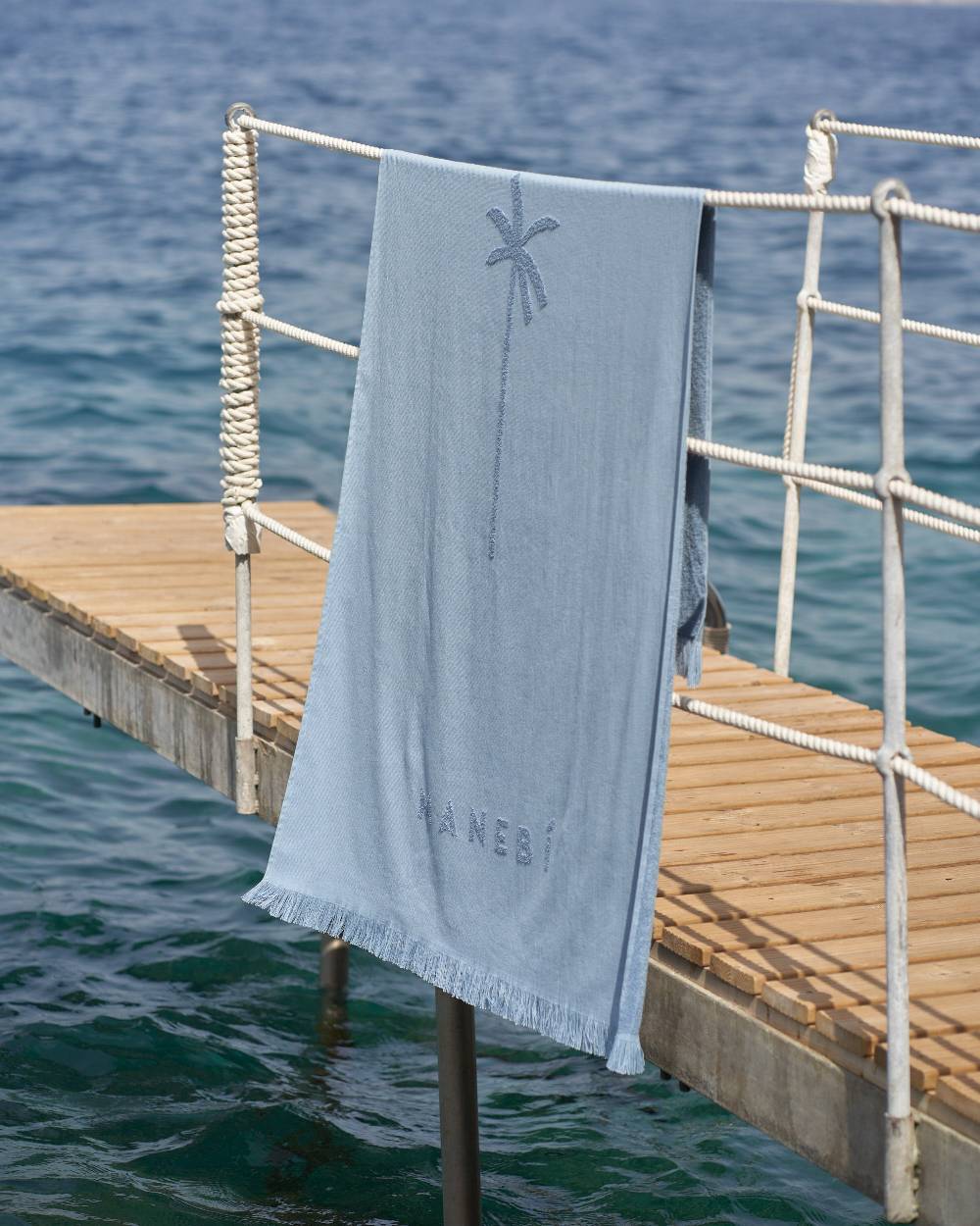 Manebí Jaquard Beach Towel - Embroidered Palm With Palm \u0026 Logo Indigo