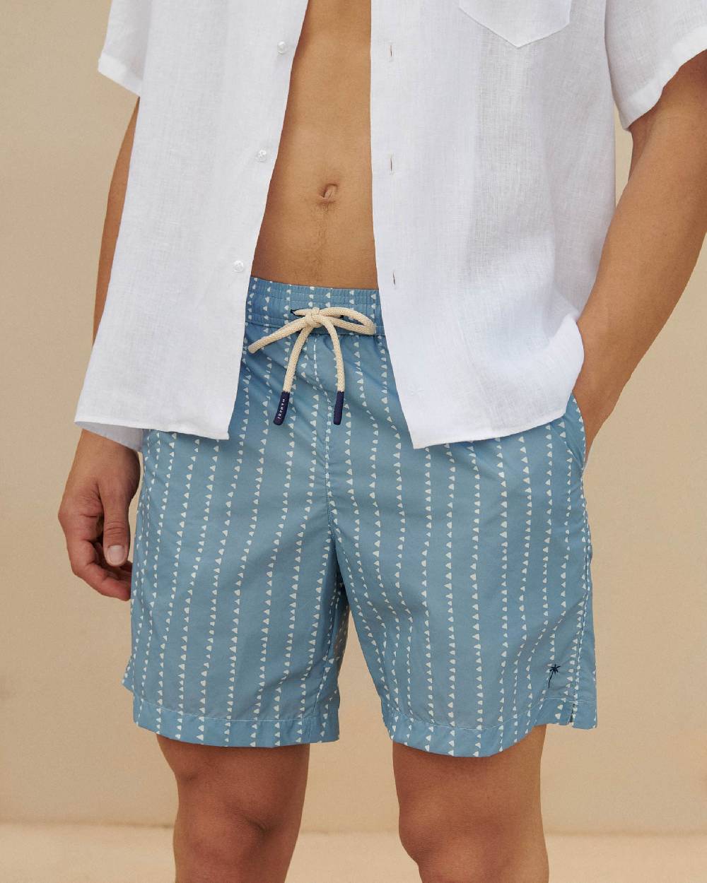 Manebí Printed Swim Shorts - Indigo With White Linear Triangles