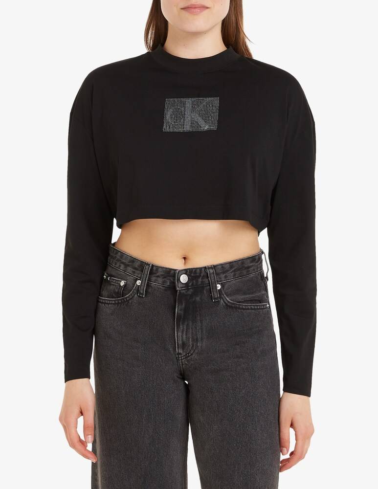 Calvin Klein Jeans Top in paillettes a manica lunga