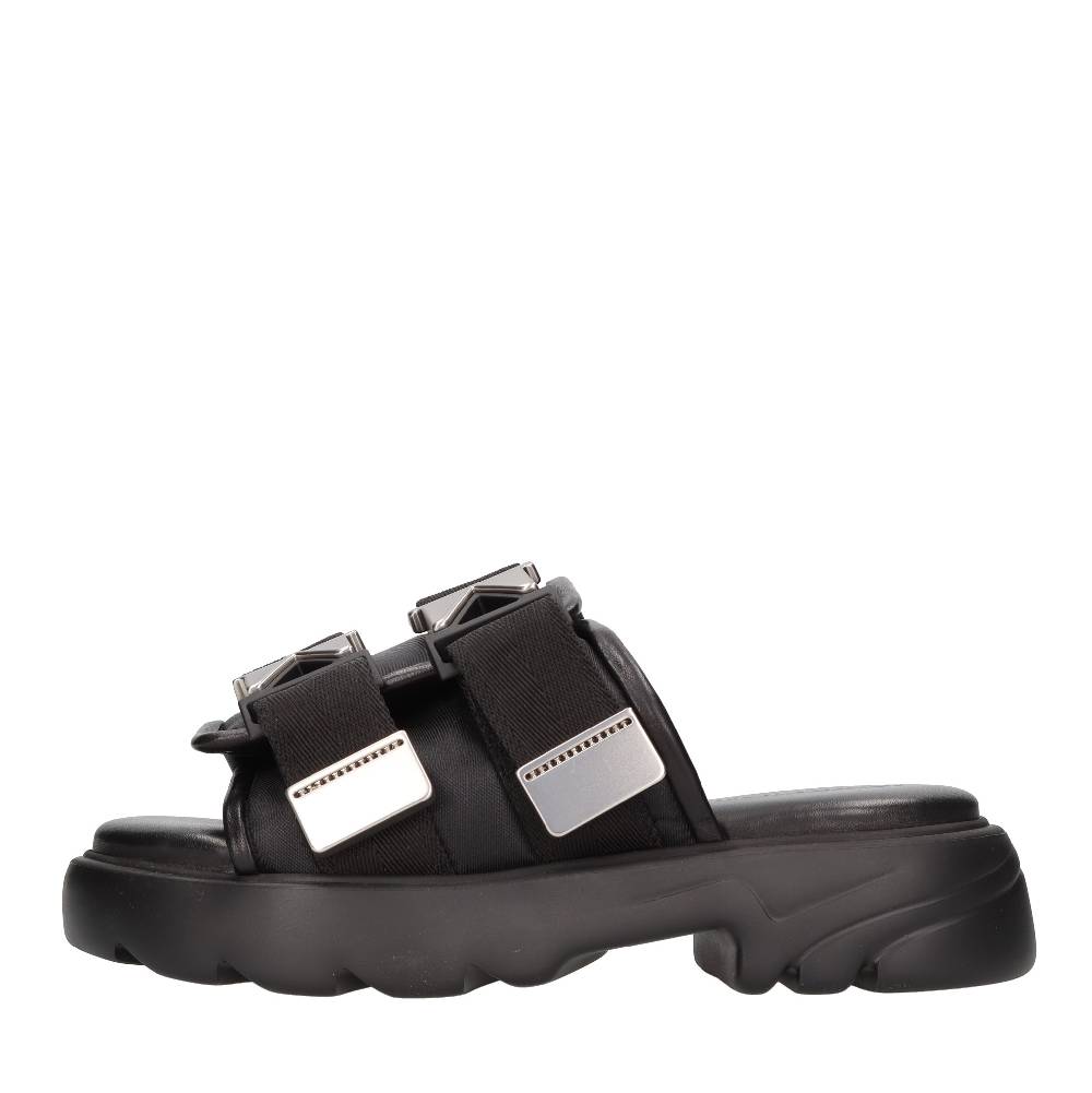 BOTTEGA VENETA Mules in pelle e tessuto