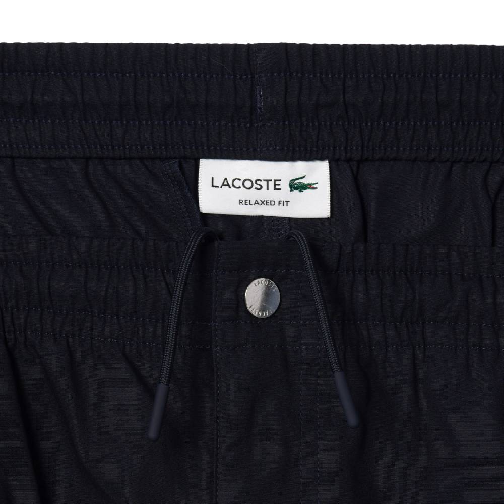 LACOSTE PANTALONI CORTI RELAXED FIT ELASTICIZZATI IN POPELINE DI COTONE GH7220HDE SKU: GH7220HDE