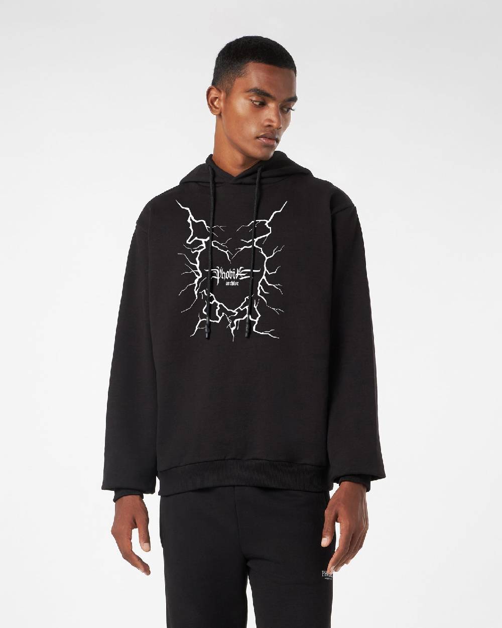 Phobia Archive FELPA CON CAPPUCCIO NERA CON GRAFICA CUORE LIGHTNING BIANCA