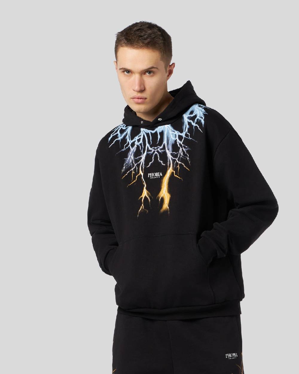 Phobia Archive FELPA NERA CON FULMINI BICOLORE BLU E GIALLO