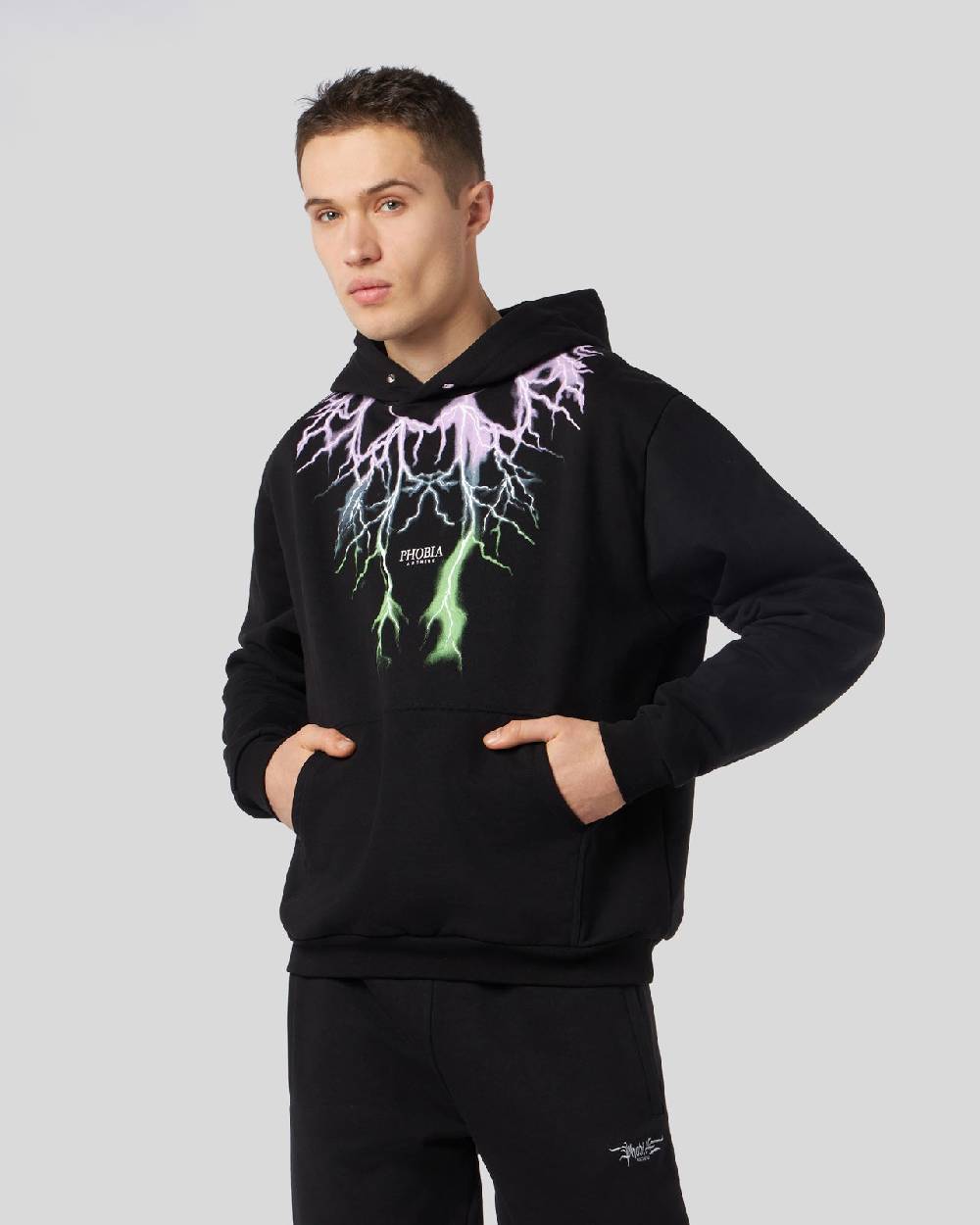 Phobia Archive FELPA NERA CON FULMINI BICOLORE VIOLA E VERDE