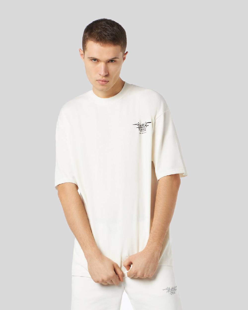 Phobia Archive T-SHIRT BIANCA CON GRAFICA FIERY COBRA VIOLA