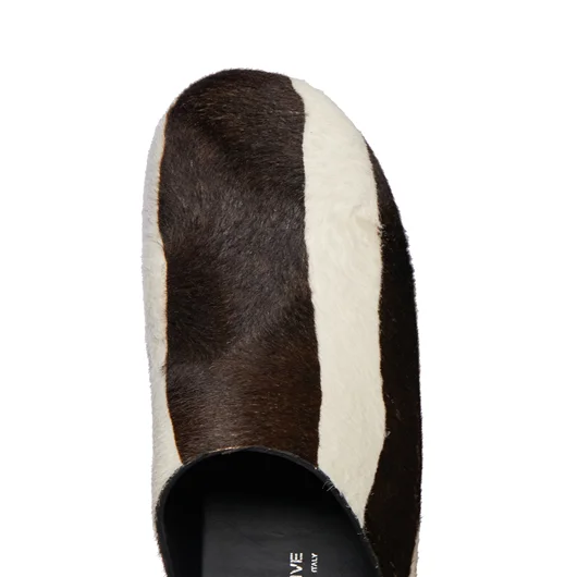 FIGURE DECORATIVE ZOCCOLI IN PELLE E LEGNO