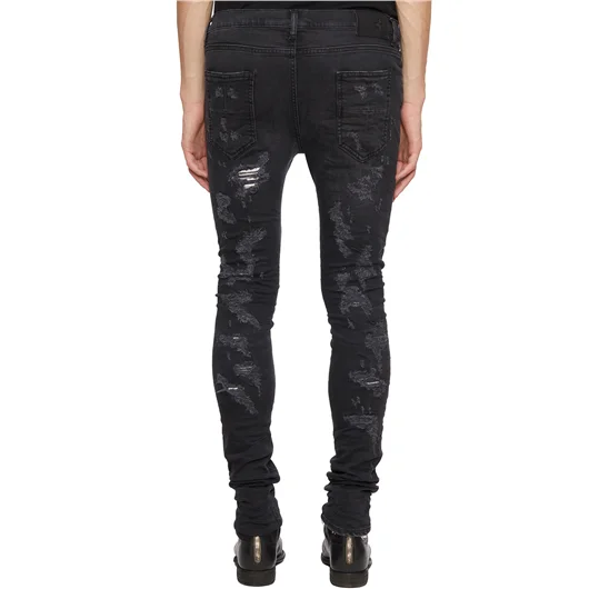 MD75 JEANS CON ROTTURE