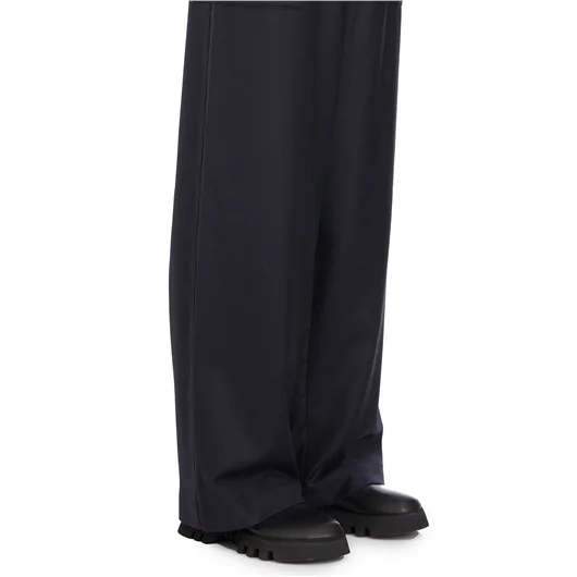 PANTALONE IN LANA CON TASCONI