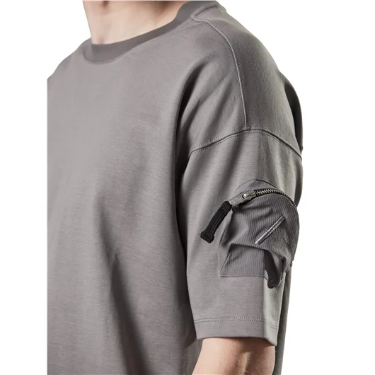 THOM KROM T-SHIRT OVERSIZE CON TASCHINO