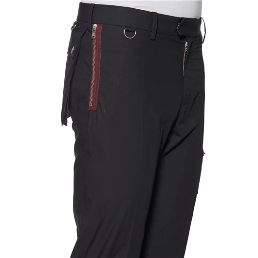 UNDERCOVER PANTALONE CON ZIP IN CONTRASTO