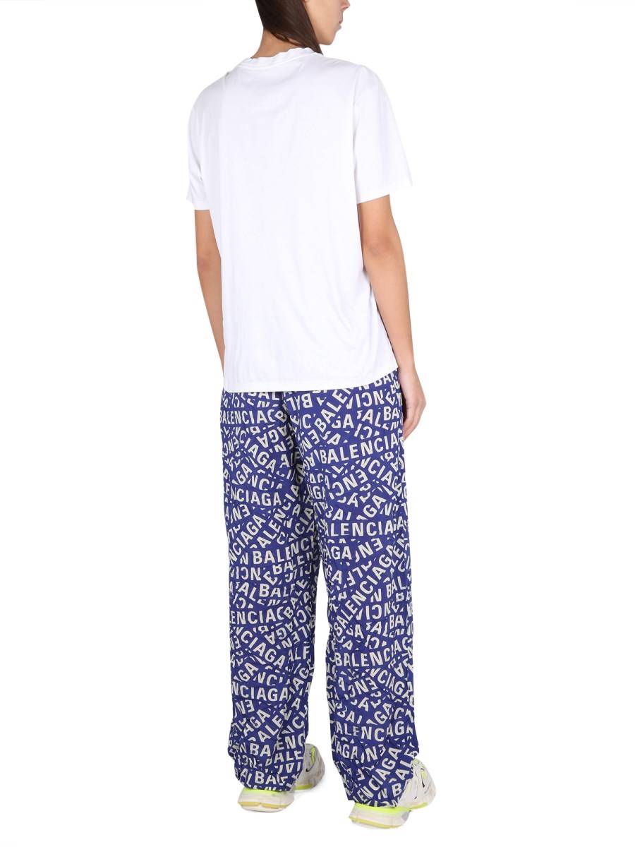 BALENCIAGA PANTALONE CON LOGO IN TESSUTO STRETCH