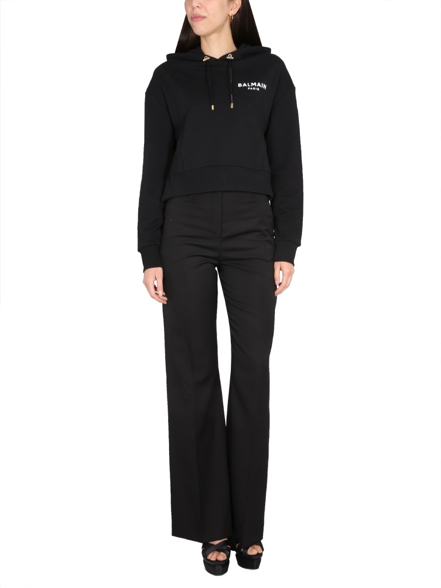 BALMAIN FELPA IN COTONE CON LOGO FLOCCATO
