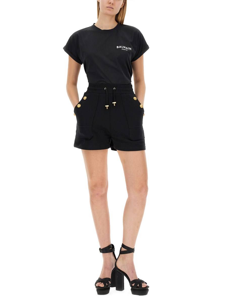 BALMAIN T-SHIRT CON LOGO FLOCCATO
