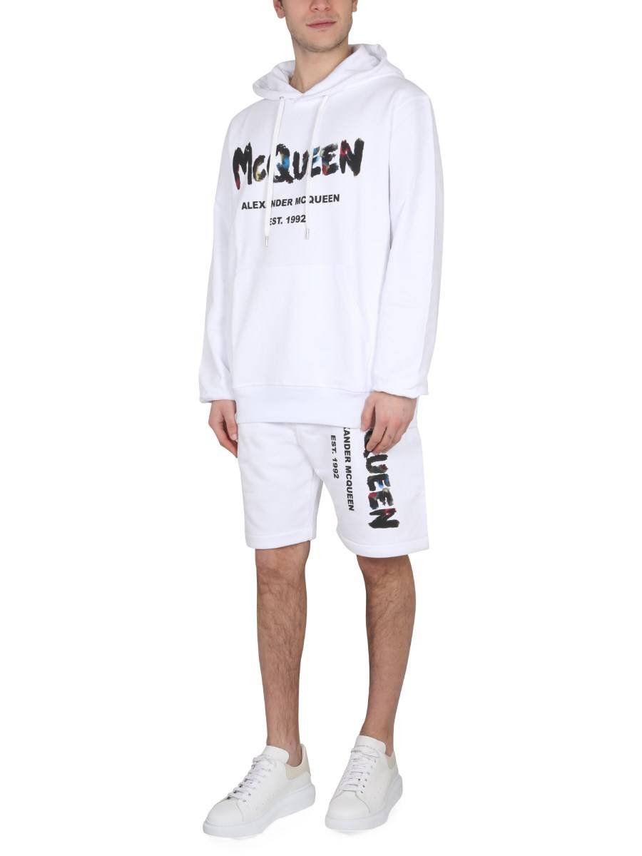 ALEXANDER McQUEEN BERMUDA CON STAMPA LOGO GRAFFITI ACQUARELLO
