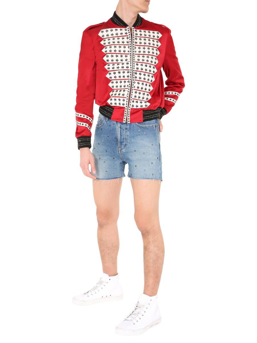 SAINT LAURENT BERMUDA IN DENIM DI COTONE CON OCCHIELLI METALLICI