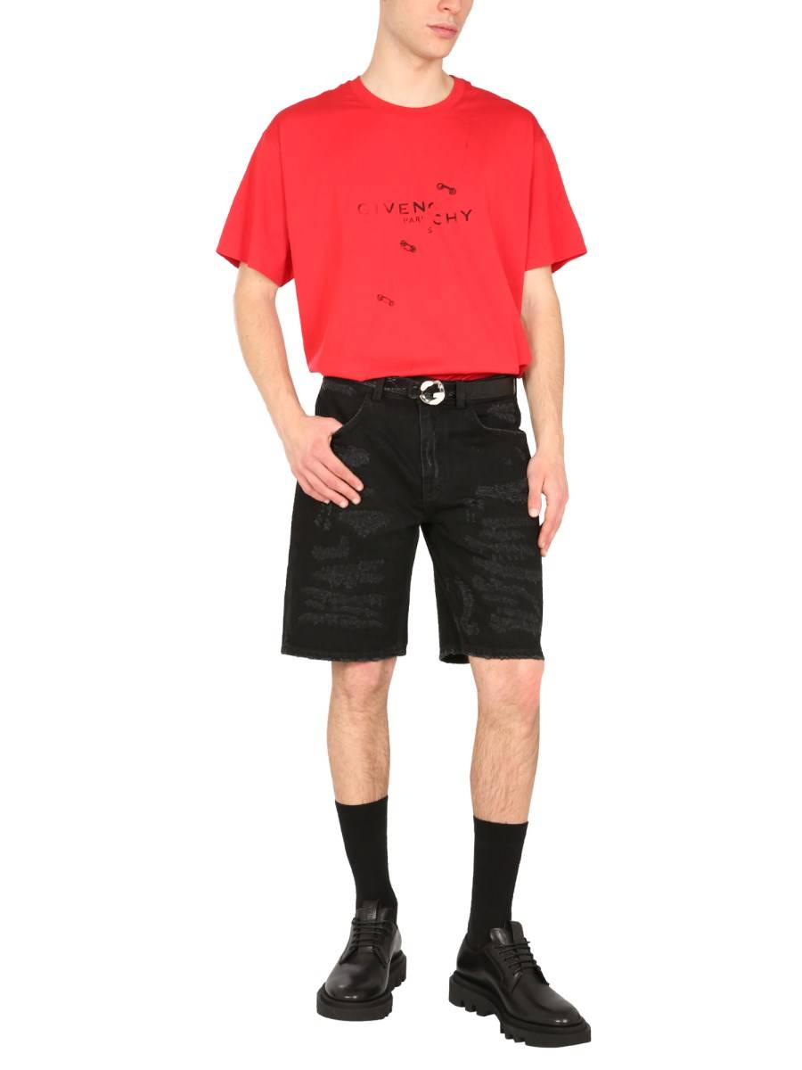 GIVENCHY BERMUDA IN DENIM DI COTONE EFFETTO DESTROYED