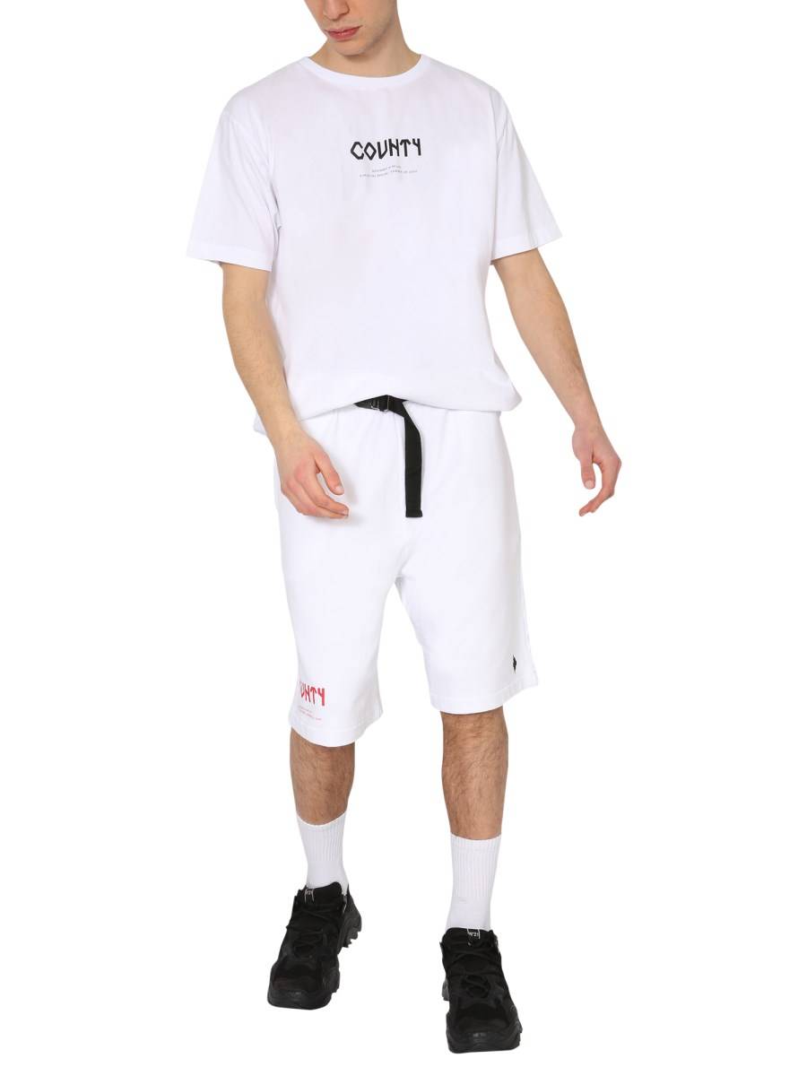 MARCELO BURLON COUNTY OF MILAN BERMUDA IN FELPA DI COTONE CON LOGO