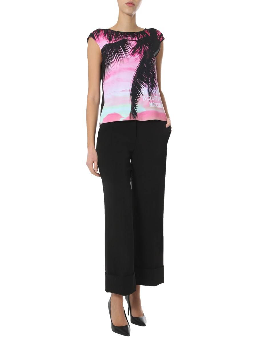 BOUTIQUE MOSCHINO TOP SMANICATO CON STAMPA PALME