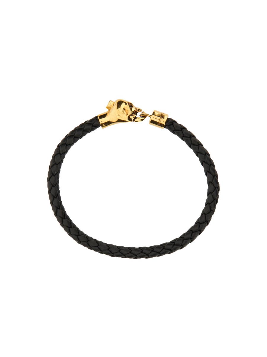ALEXANDER McQUEEN BRACCIALE IN PELLE INTRECCIATA CON CHARM SKULL