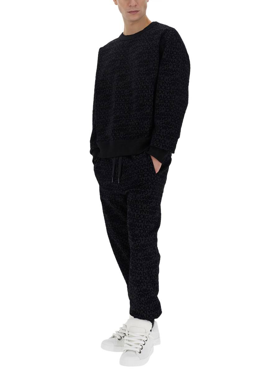 DOLCE & GABBANA PANTALONE JOGGING CON LOGO ALL OVER
