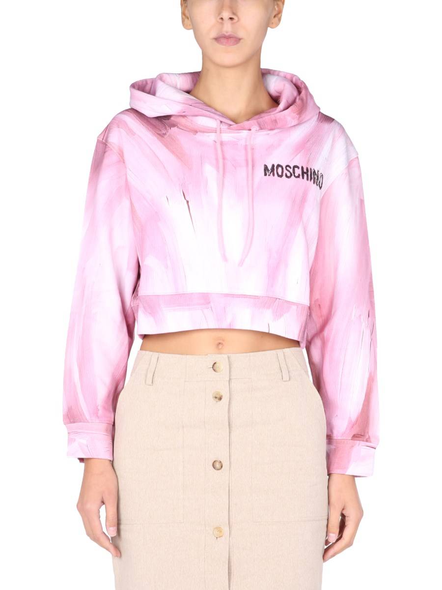 MOSCHINO FELPA CROPPED ART THEME IN JERSEY DI COTONE CON STAMPA LOGO GOMMATA