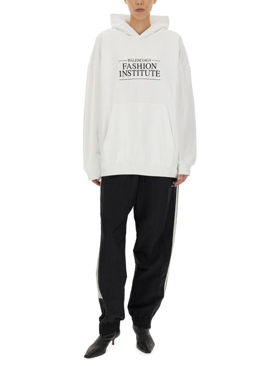 BALENCIAGA FELPA FASHION INSTITUTE LARGE FIT IN COTONE