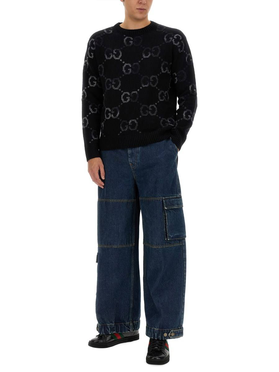 GUCCI PANTALONE IN DENIM CON ETICHETTA GUCCI