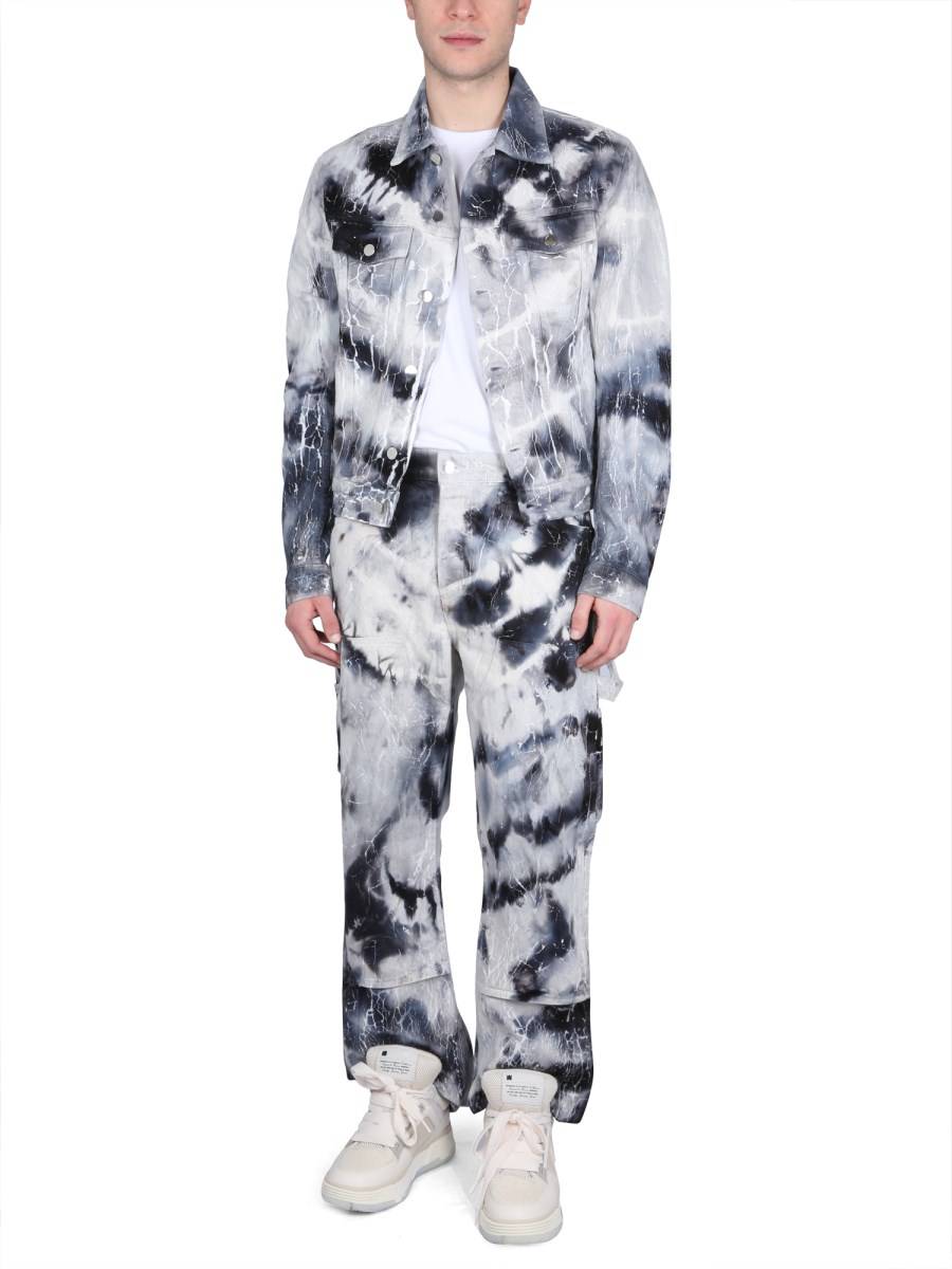 AMIRI JEANS CRACKED TIE-DYE CARPANTER IN DENIM DI COTONE