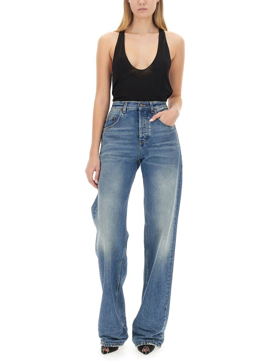 SAINT LAURENT JEANS LARGHI EXTRA-LUNGHI IN DENIM EFFETTO STROPICCIATO