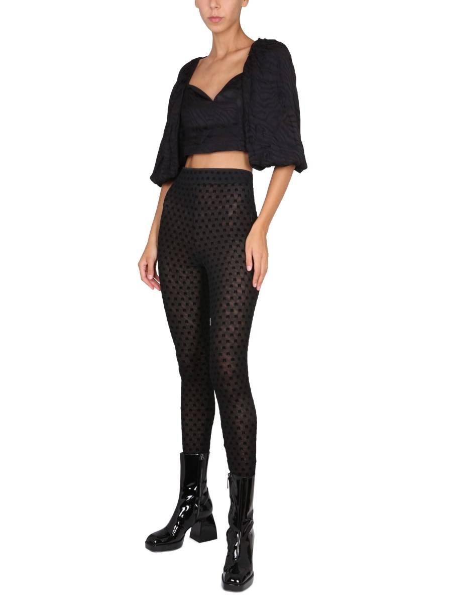 ROTATE BIRGER CHRISTENSEN LEGGINGS CON LOGO ALL OVER