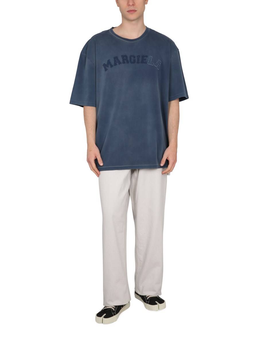 MAISON MARGIELA JEANS CIMOSATI IN STILE UTILITY