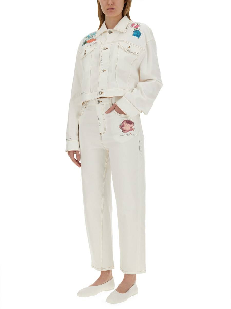 MARNI PANTALONI IN DENIM CON APPLICAZIONE A FIORE