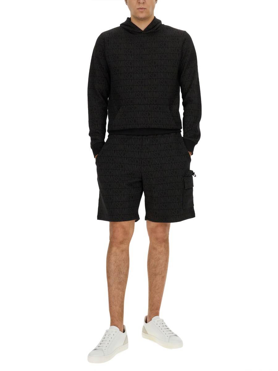 MOSCHINO FELPA CON LOGO ALL OVER