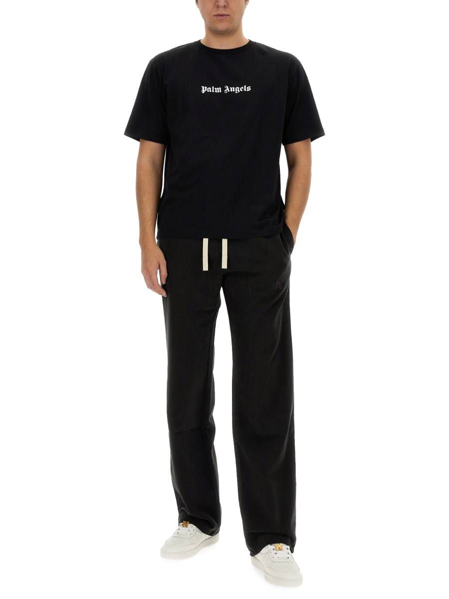 PALM ANGELS PANTALONE IN LYOCEL CON LOGO