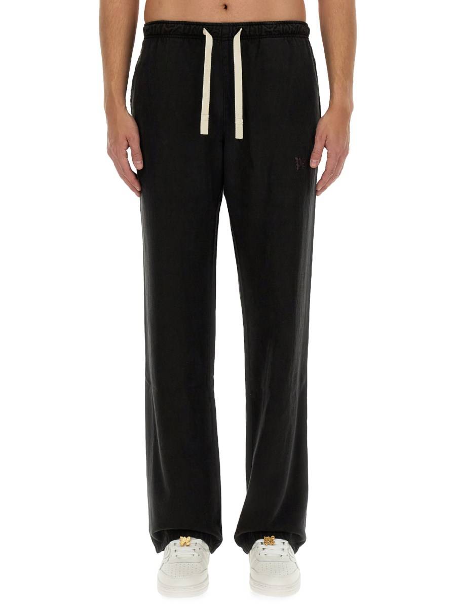 PALM ANGELS PANTALONE IN LYOCEL CON LOGO