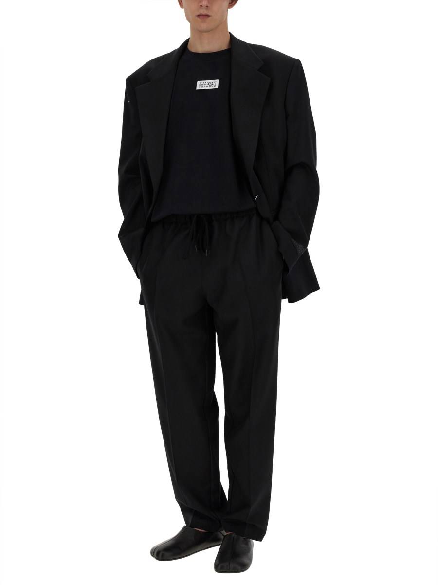 MM6 MAISON MARGIELA PANTALONE IN LANA CON GAMBA AFFUSOLATA