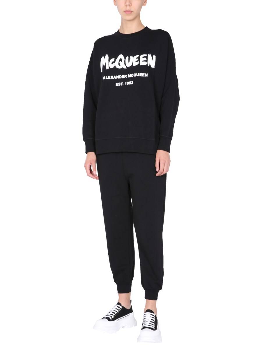 ALEXANDER McQUEEN PANTALONE JOGGING IN COTONE CON STAMPA LOGO