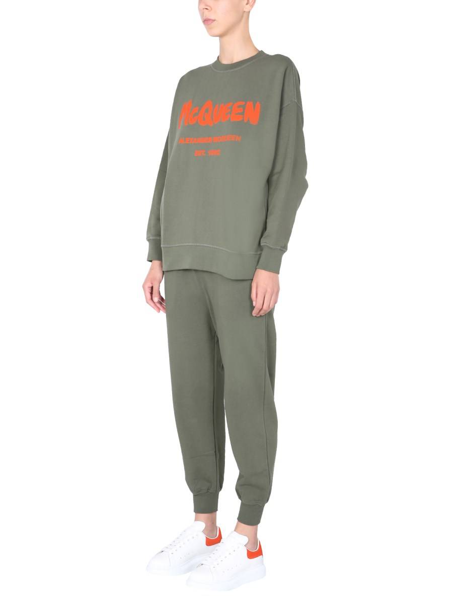 ALEXANDER McQUEEN PANTALONE JOGGING IN COTONE CON STAMPA LOGO