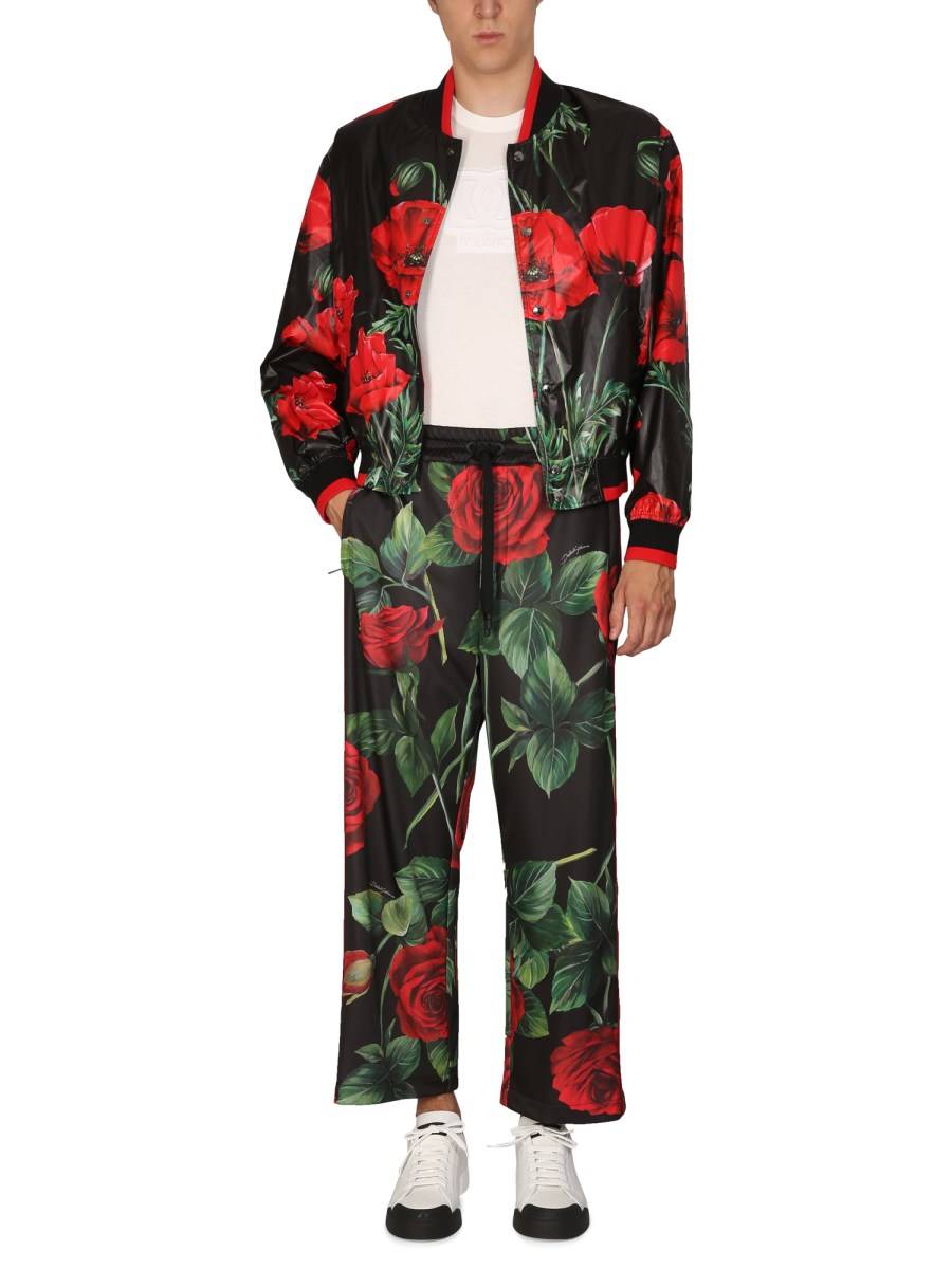 DOLCE & GABBANA PANTALONE JOGGING IN JERSEY TECNICO CON STAMPA ROSE