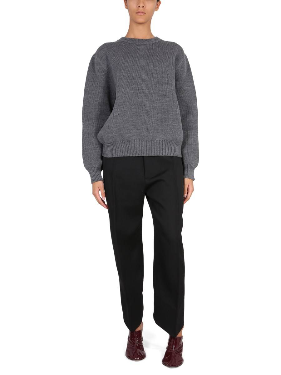 BOTTEGA VENETA PANTALONI IN LANA COMPATTA CON GAMBE CURVE