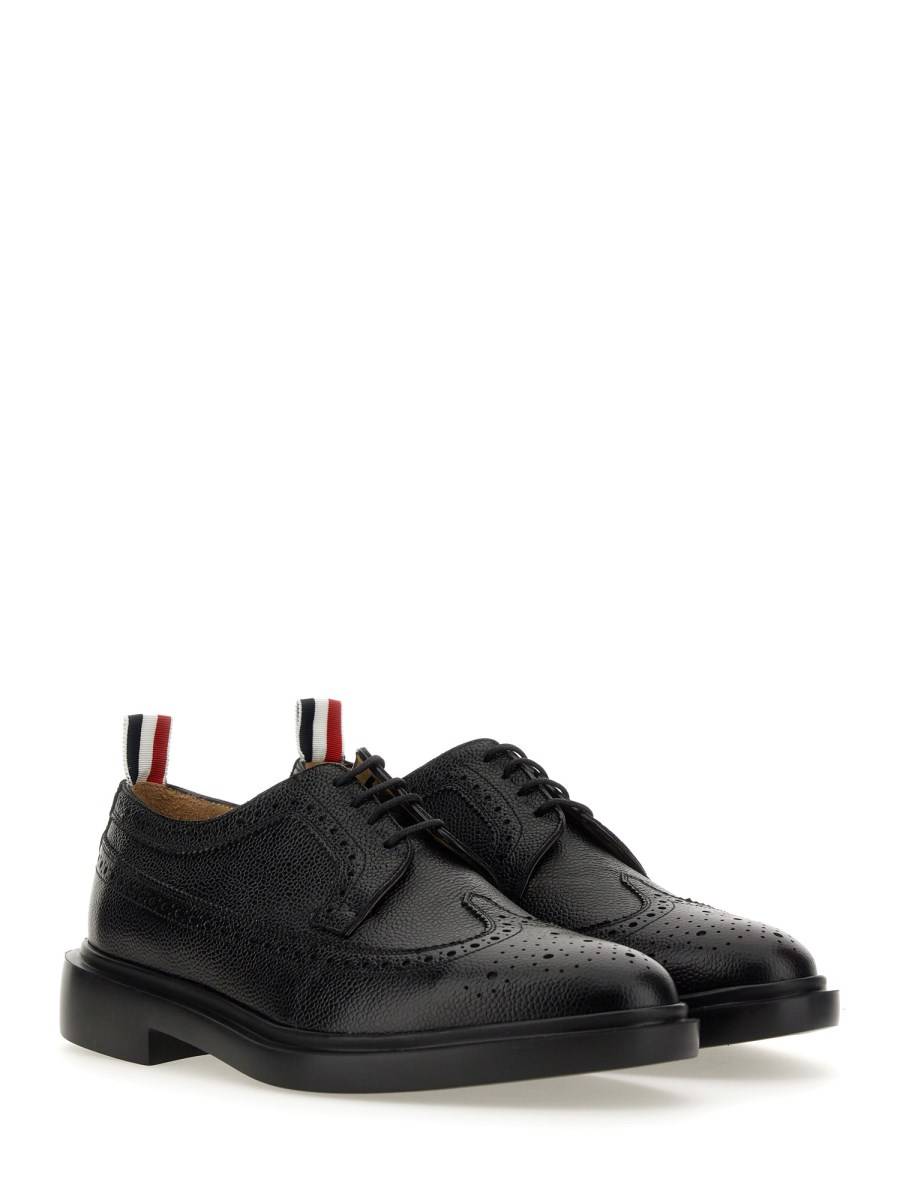 THOM BROWNE STRINGATA LONGWING BROGUE IN PELLE PEBBLE GRAIN